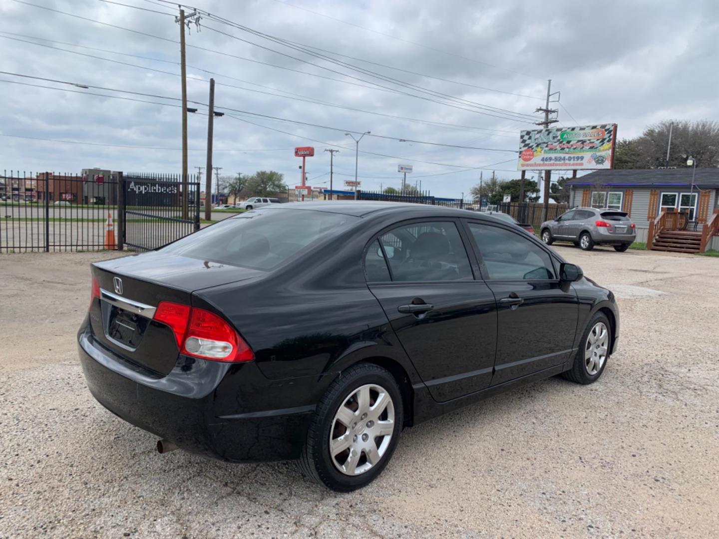 2010 Black /gray Honda Civic LX Sedan (19XFA1F56AE) with an 1.8L L4 SOHC 16V engine, Automatic transmission, located at 1830 North Belt Line Road, Irving, TX, 75061, (469) 524-0199, 32.834373, -96.993584 - Photo#5